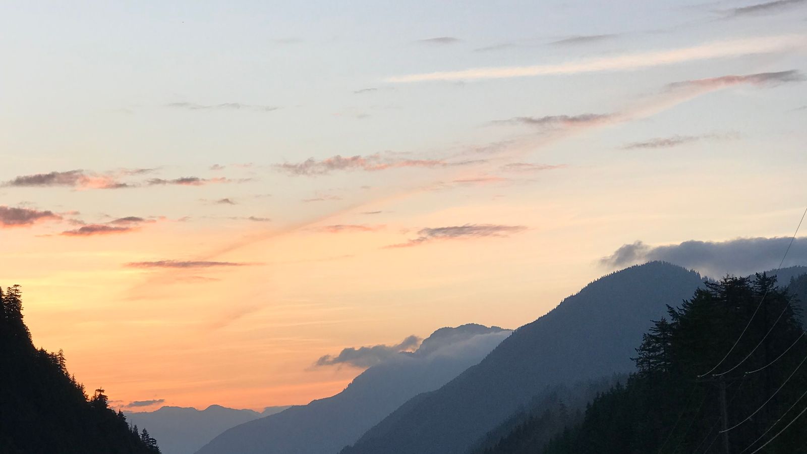 About Luxury Tours Canada: the Trans-Canada Highway crossing the Rockies at dusk