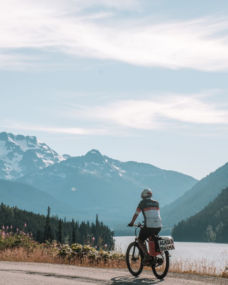 The road-experience behind Luxury Tours Canada: a highway and a bicycle