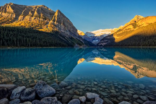 Lake Louise at sunrise on a private Banff tour before the day visitors arrive
