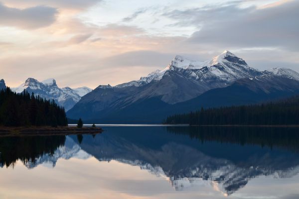 Maligne Lake in Jasper National Park at dawn on a private Jasper tour