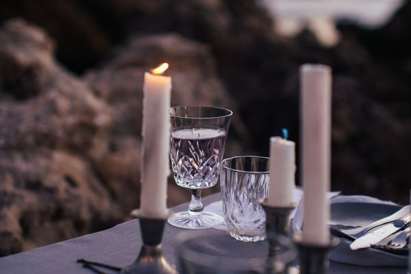 Private dinner setting at a lodge table with a view