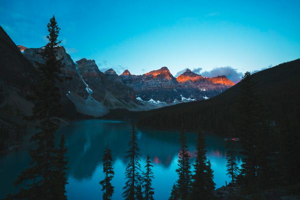 Lake at first light on a private tour of Canada, before the day visitors
