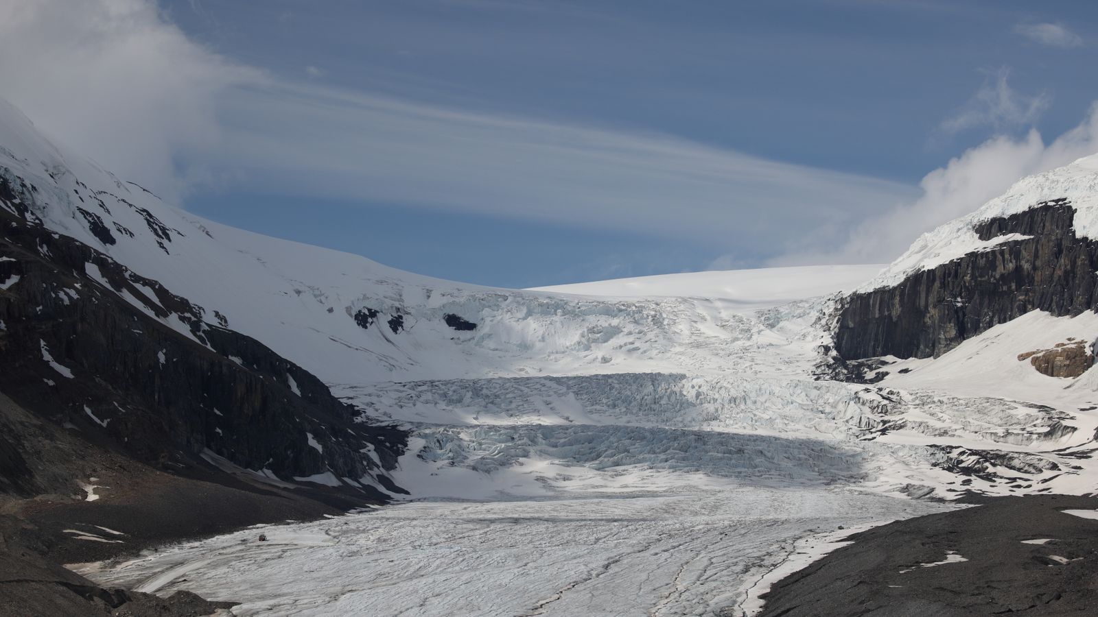 The Icefields Parkway in summer with a glacier above the valley