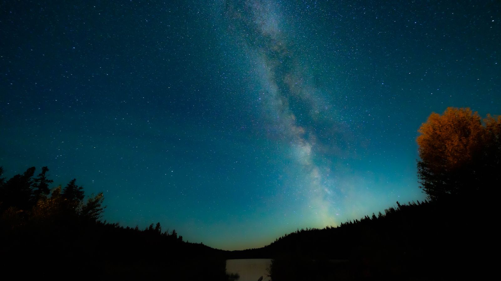 Night sky over a Rockies lake in Jasper