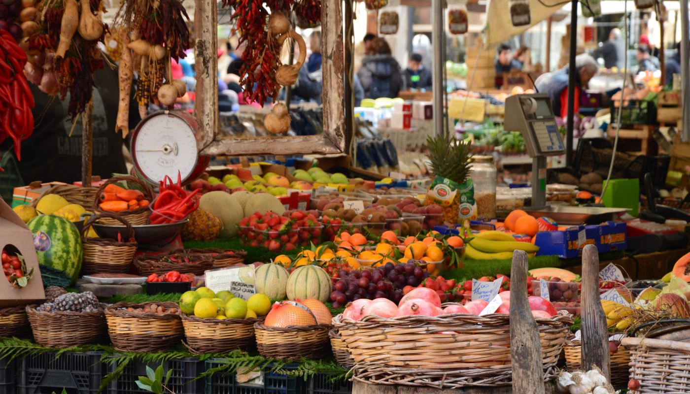 Market stalls under the trees in Centennial Park on a summer Saturday