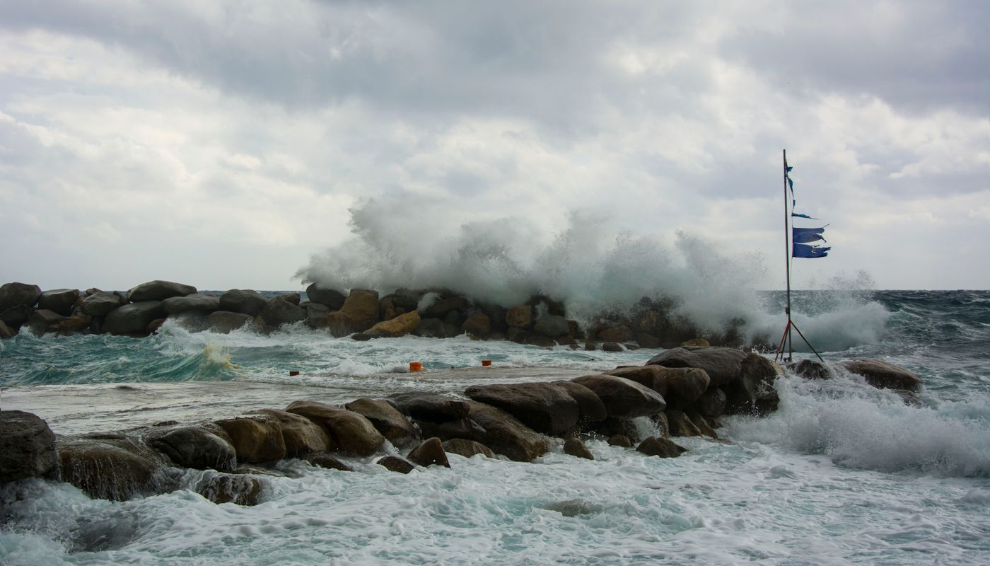 Winter swell breaking on the rocks near Tofino during storm watching season