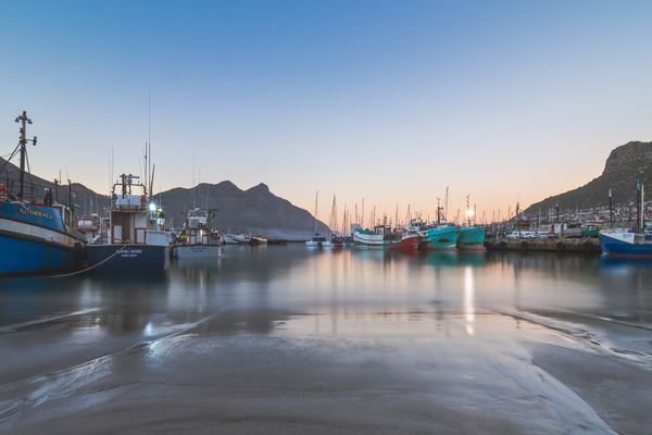Fishing boats at anchor in Tofino harbour at dusk